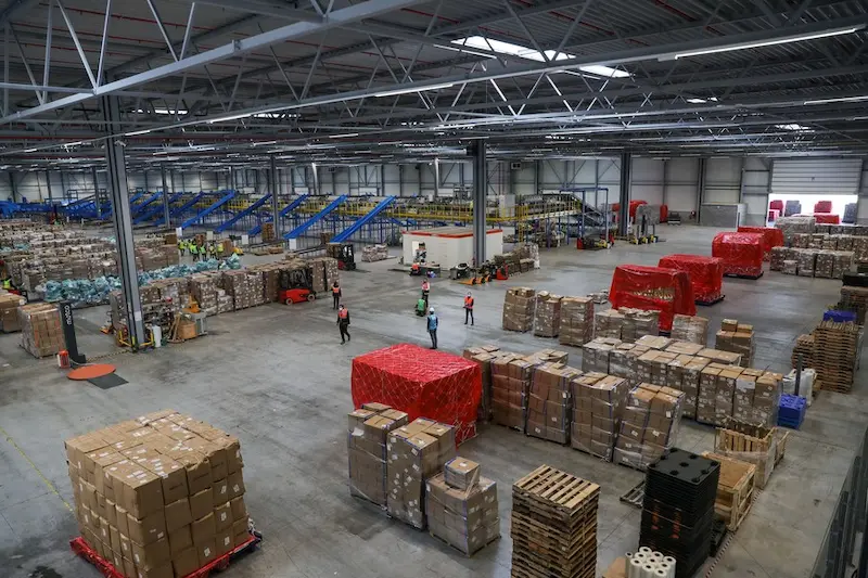 People work at Cainiao Network's smart logistics hub at Liege Airport in Grace-Hollogne, Liege Province, Belgium, on Nov. 8, 202